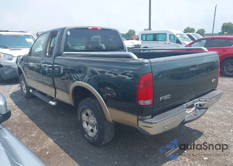 2002 Ford F150 из США, поврежденный, VIN 1FTRX18W02KA29930